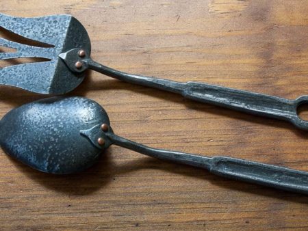 https://northwestskilletcompany.com/wp-content/uploads/2019/09/hand-forged-steel-spoon-spatula-back-450x338.jpg